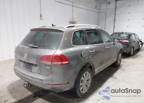 2014 Volkswagen Touareg 3.6L Sport z USA, uszkodzony, nr VIN WVGEF9BP5ED012353